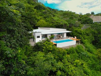 Casa Amarillo,  brand new house with stunning ocean views in a quiet gated community above Potrero