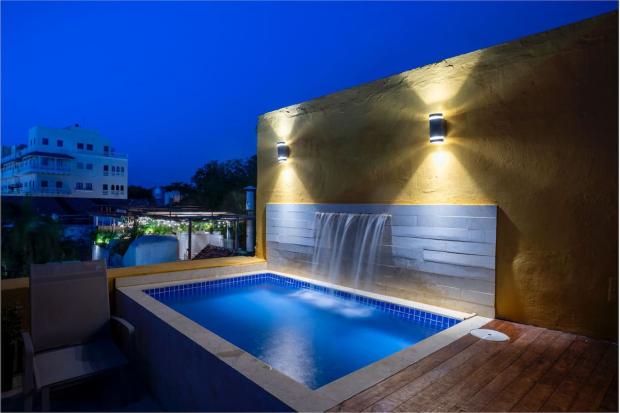 Unique Cartagena Old City 2-bedroom short term rental friendly apartment with private rooftop terrace, plunge pool and stunning city views.